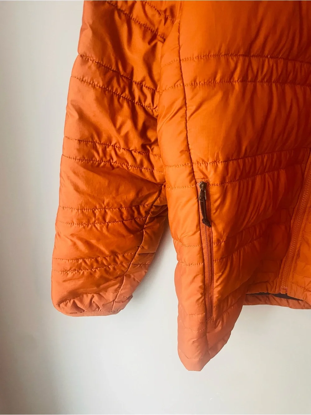 The North Face 550 Orange Rust Puffer Jacket